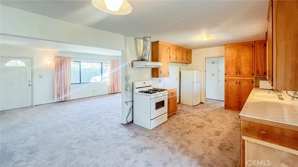 a view of a kitchen with a sink cabinets and a kitchen