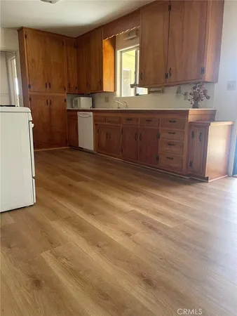 a room with a cabinets and a sink