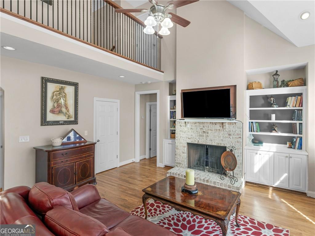 355 Parker Road Covington, GA 30014 - Photo 31 of 60 a living room with furniture fireplace and flat screen tv