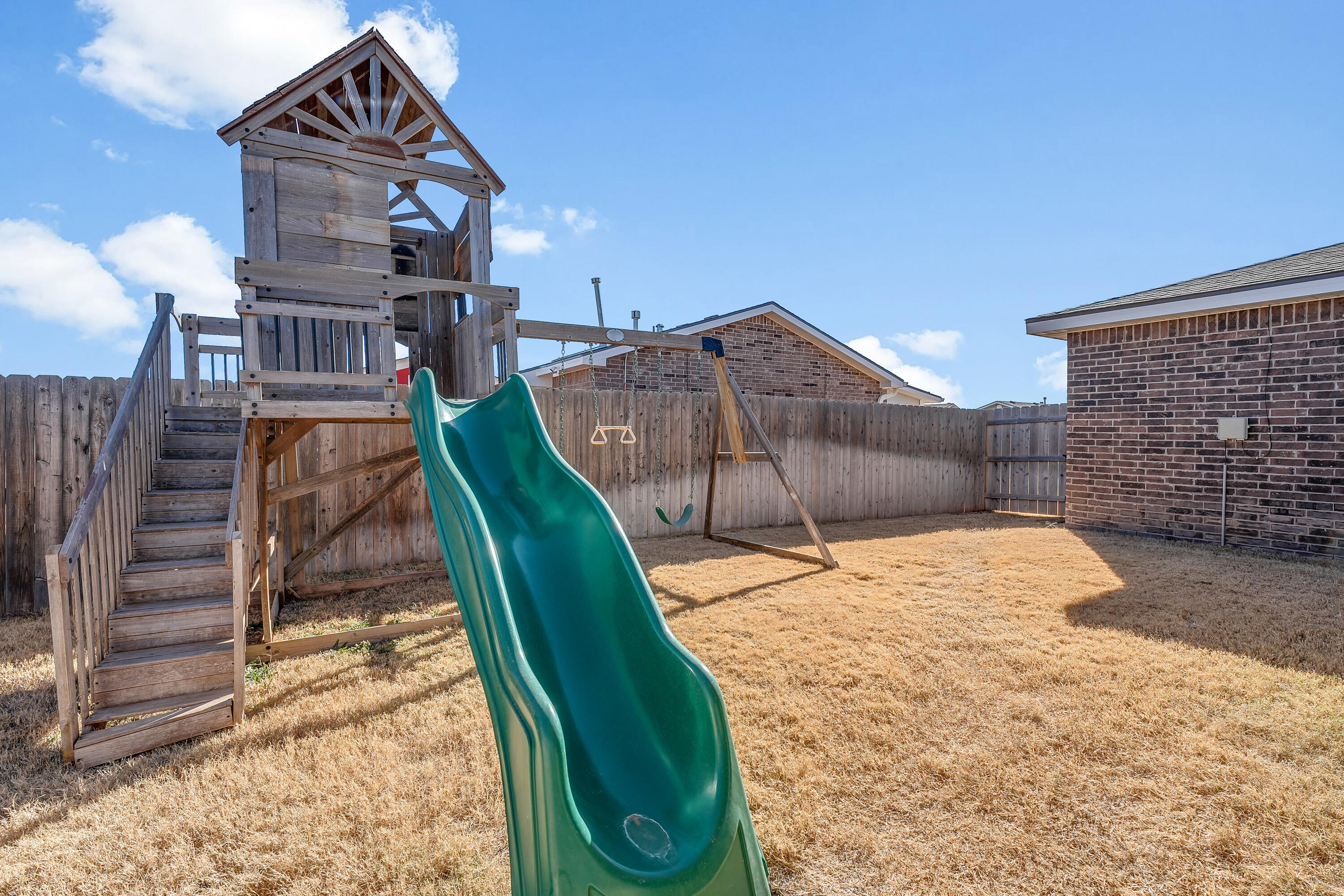 7510 28th Street Lubbock, TX 79407 - Photo 18 of 19 a view of a house with a yard