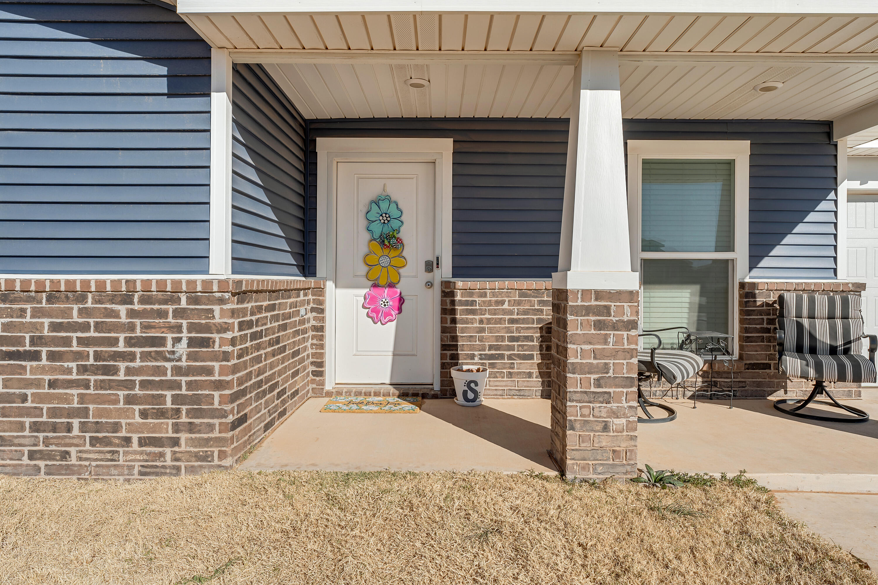 7510 28th Street Lubbock, TX 79407 - Photo 2 of 19 a view of a patio with table and chairs and potted plants
