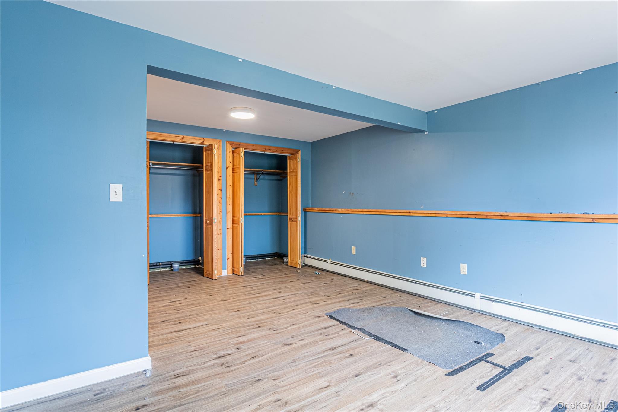 616 North Elting Corners Road Highland, NY 12528 - Photo 17 of 27 a view of an empty room with wooden floor and a window