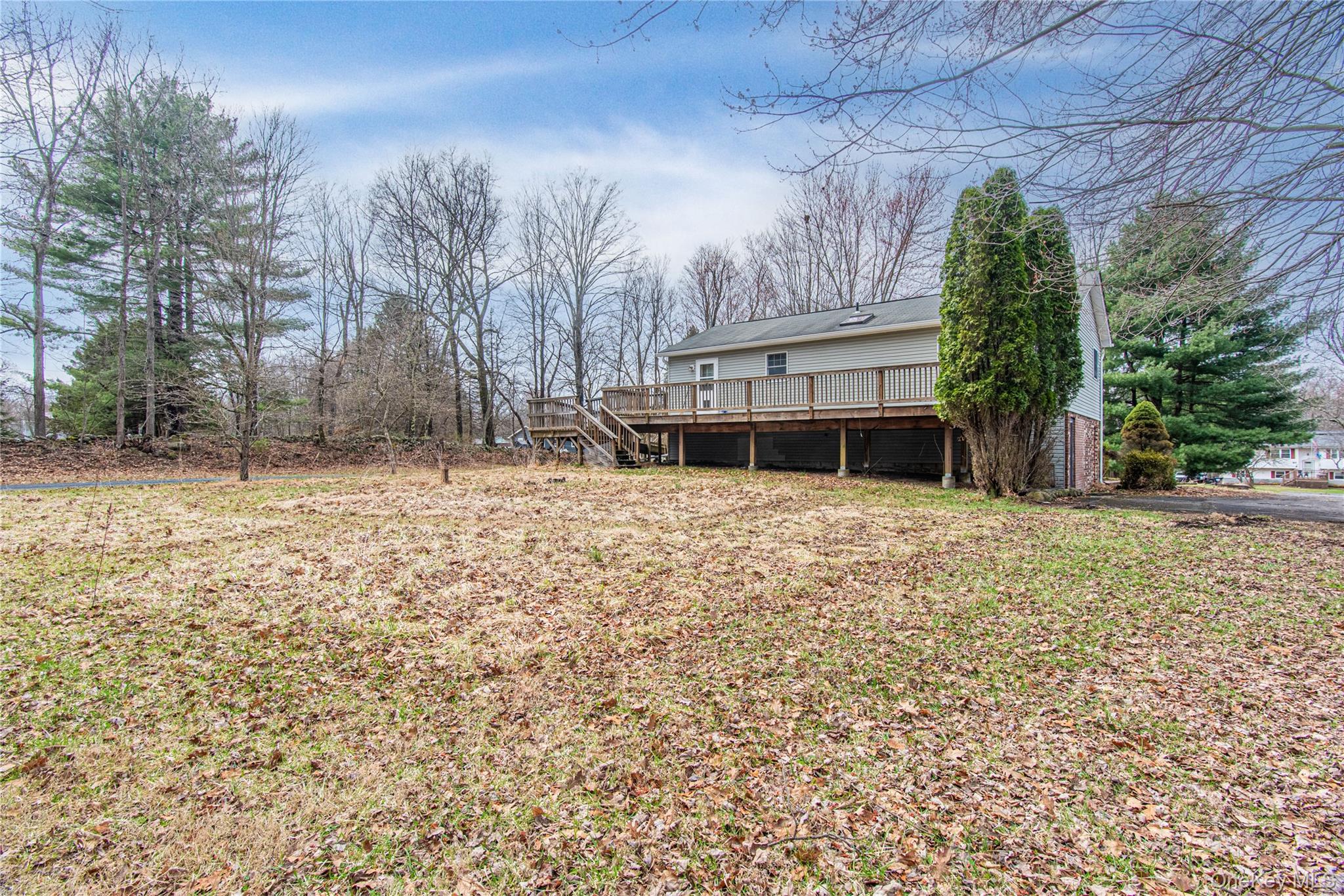 616 North Elting Corners Road Highland, NY 12528 - Photo 2 of 27 a front view of a house with a yard