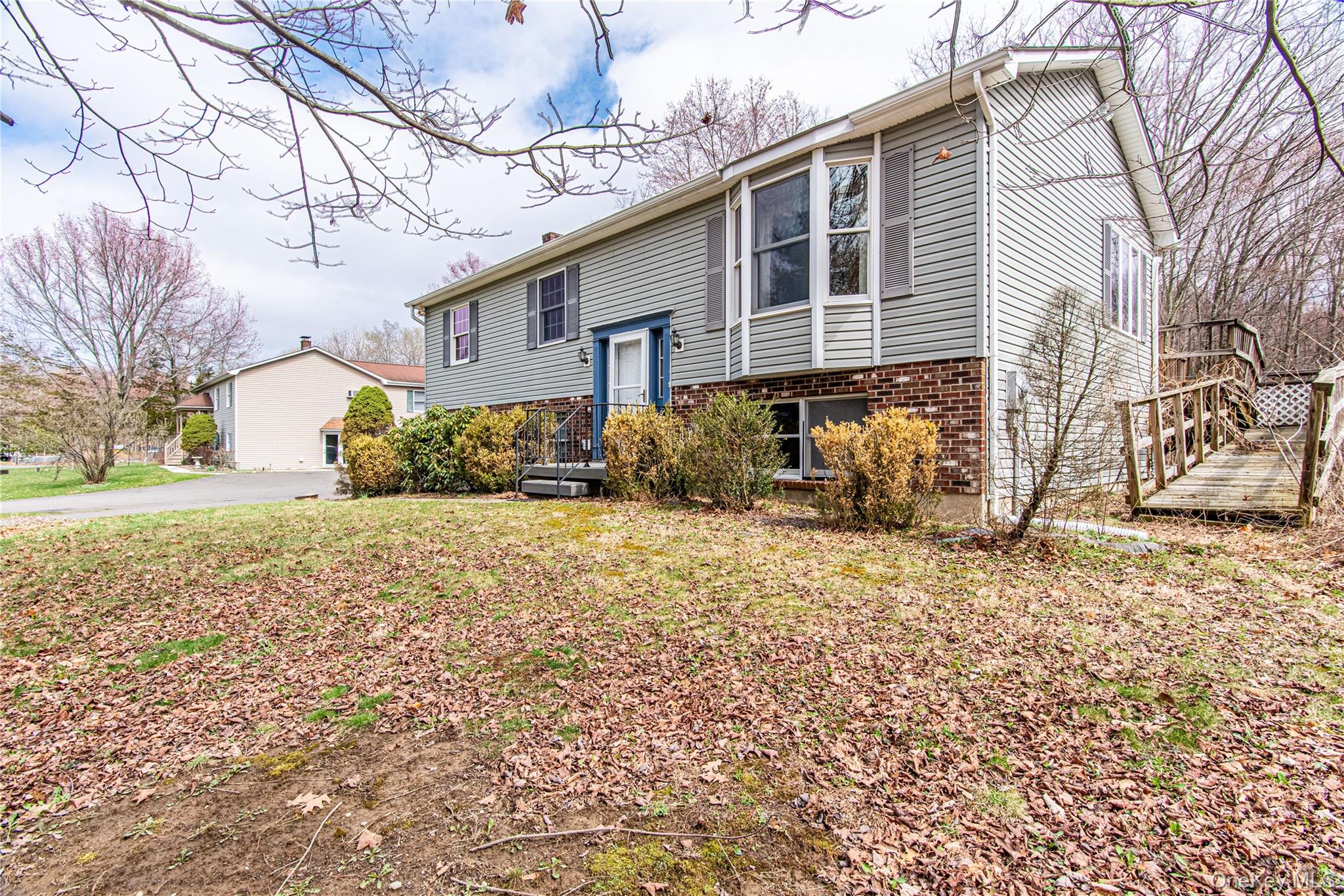 616 North Elting Corners Road Highland, NY 12528 - Photo 24 of 27 a front view of a house with a yard