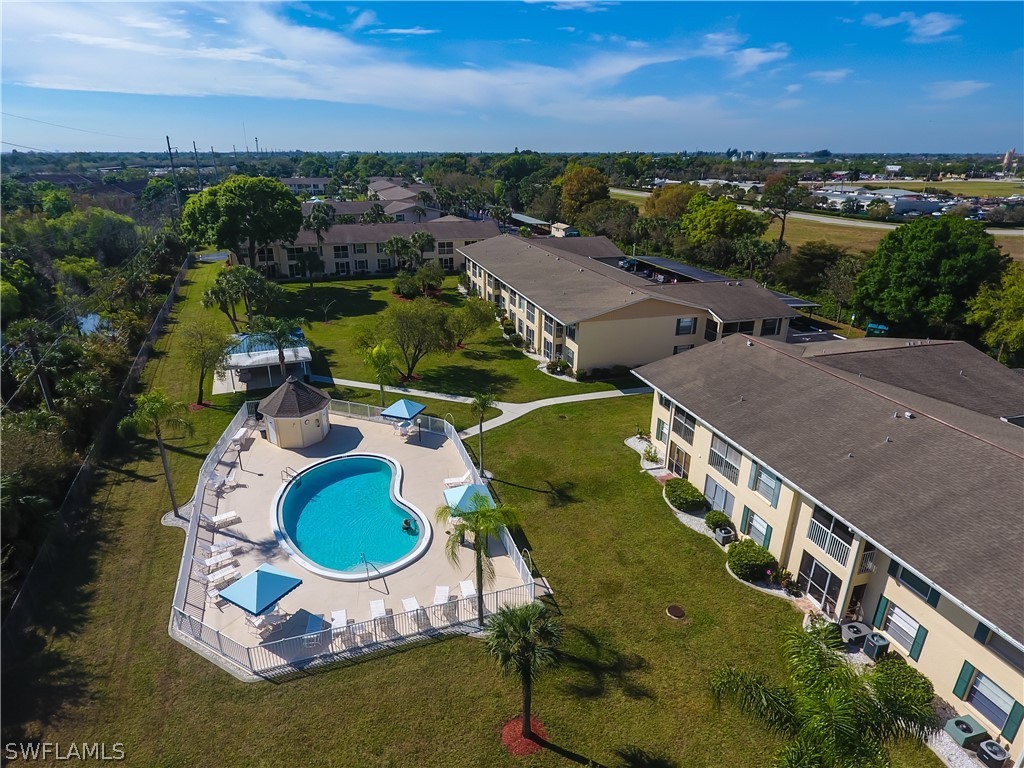 1100 Pondella Road, Unit 811 Cape Coral, FL 33909 - Photo 1 of 35 an aerial view of a house with outdoor space