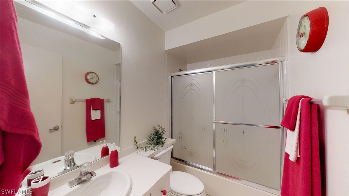 1100 Pondella Road, Unit 811 Cape Coral, FL 33909 - Photo 17 of 35 a bathroom with a sink and a mirror