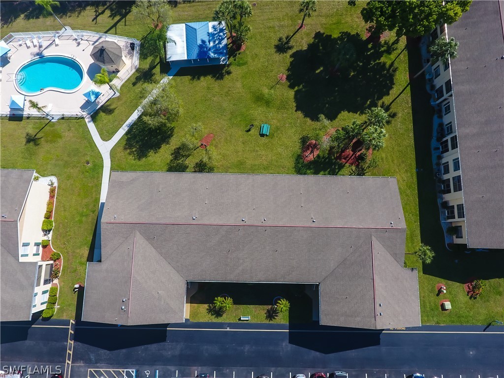 1100 Pondella Road, Unit 811 Cape Coral, FL 33909 - Photo 25 of 35 an aerial view of a house with a swimming pool