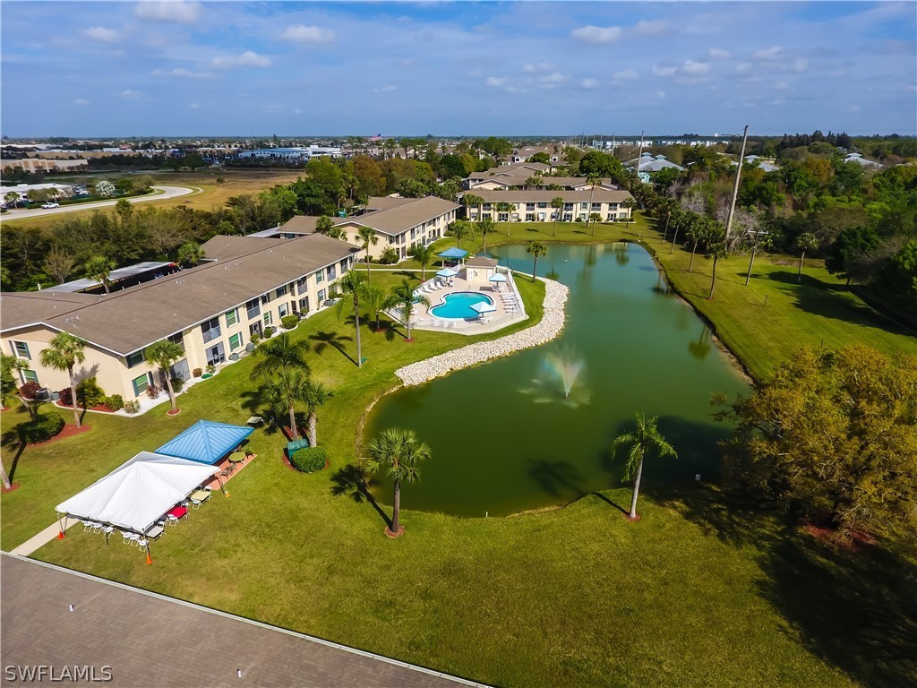 1100 Pondella Road, Unit 811 Cape Coral, FL 33909 - Photo 30 of 35 an aerial view of ocean residential house with outdoor space and garden