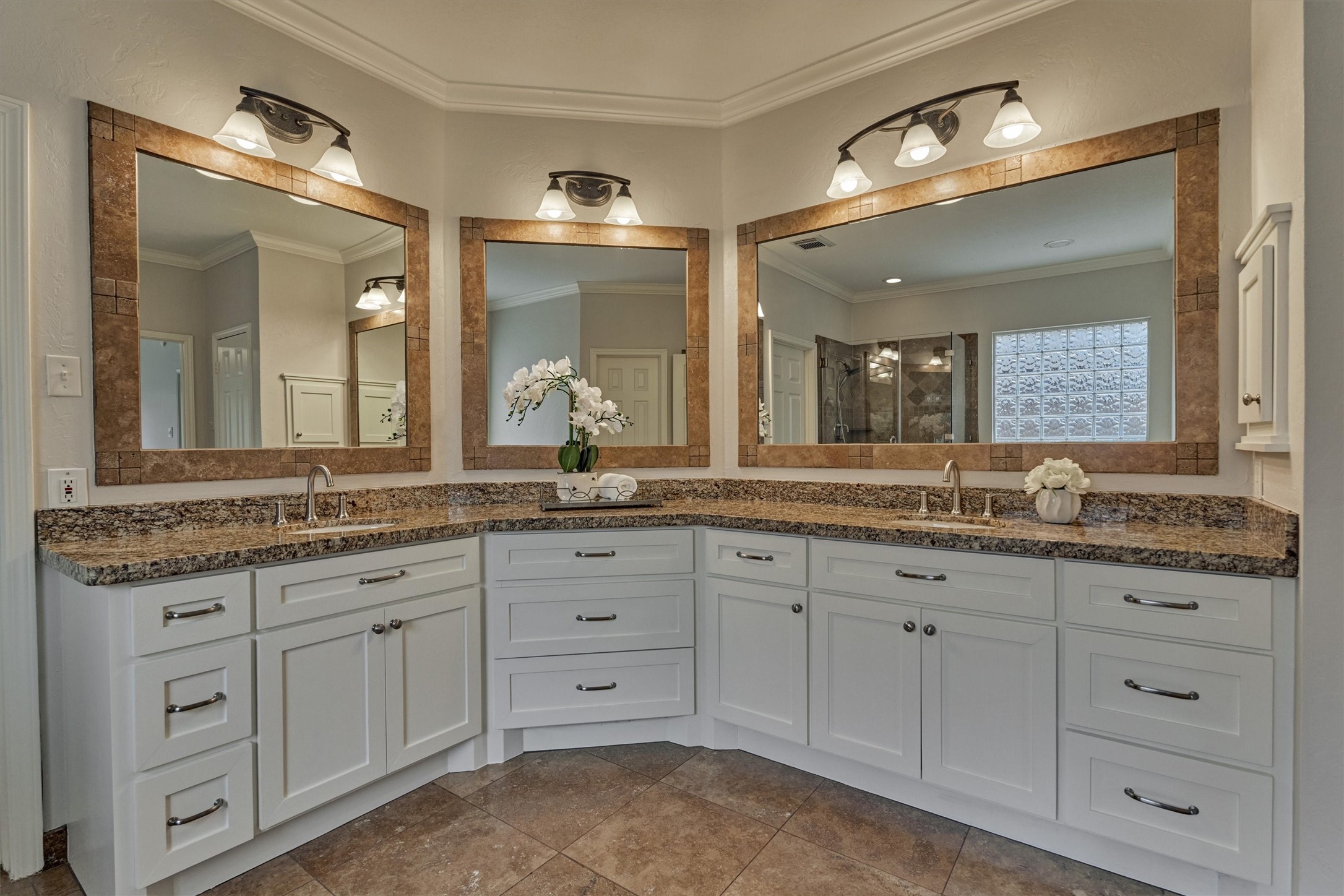 16707 Avenfield Road Tomball, TX 77377 - Photo 22 of 50 a bathroom with a granite countertop sink double and mirror