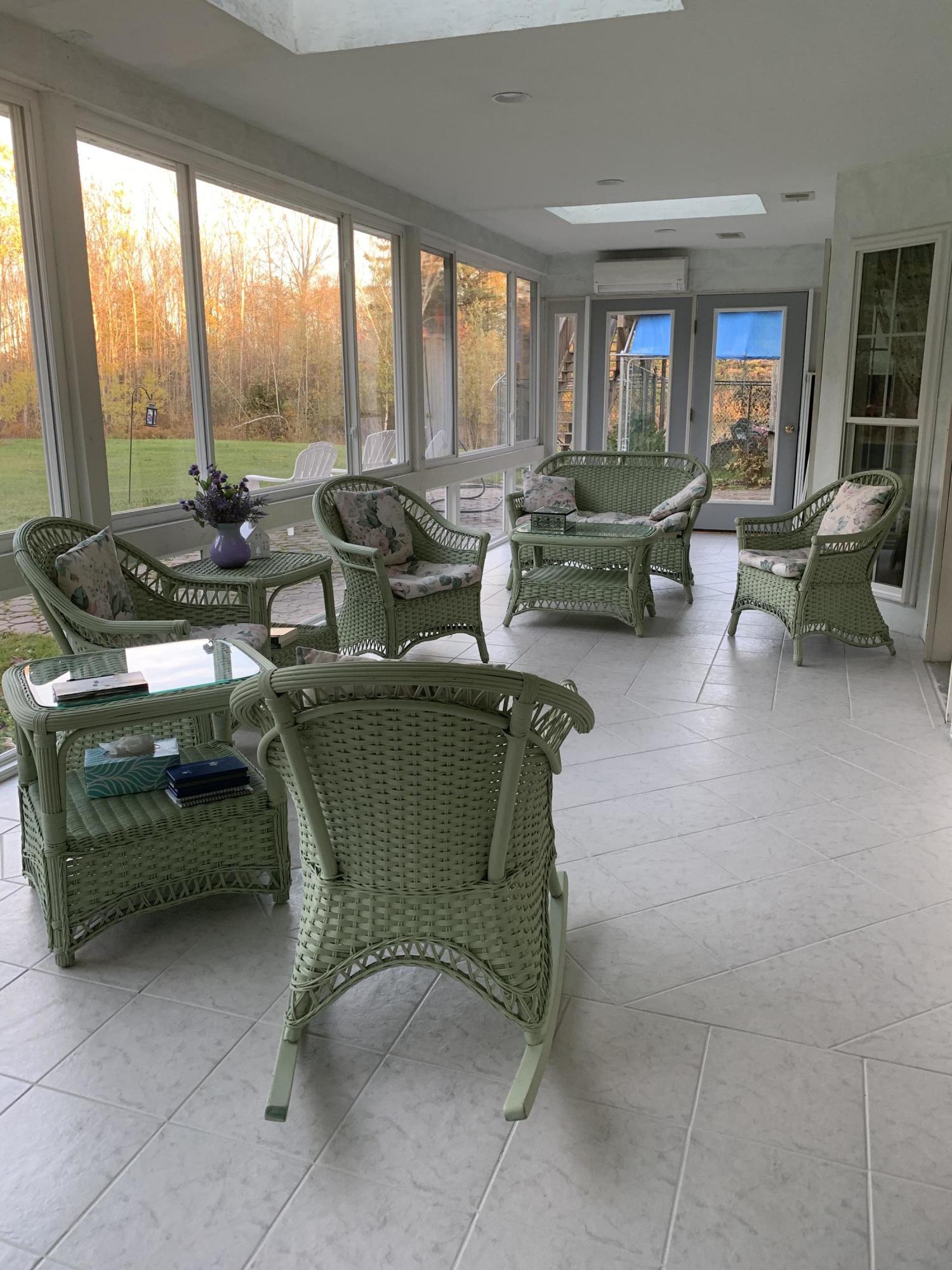 717 Tate Road Corinth, ME 04427 - Photo 20 of 57 heated sunroom