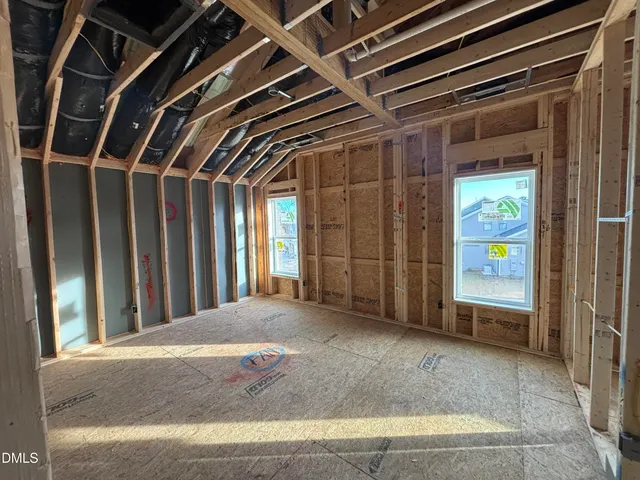 a view of hallway with windows