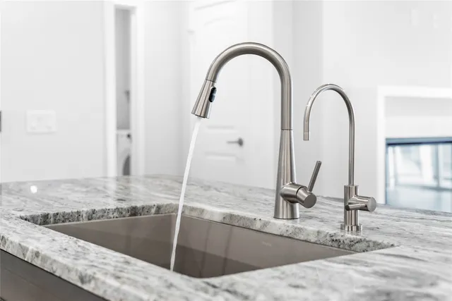 a view of a room that has a large window