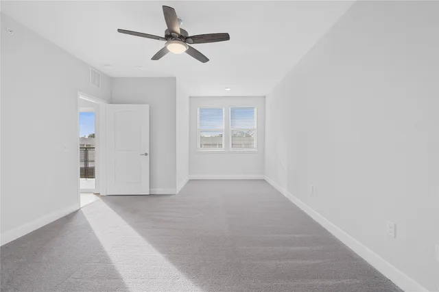 a bathroom with a white bath tub and a shower