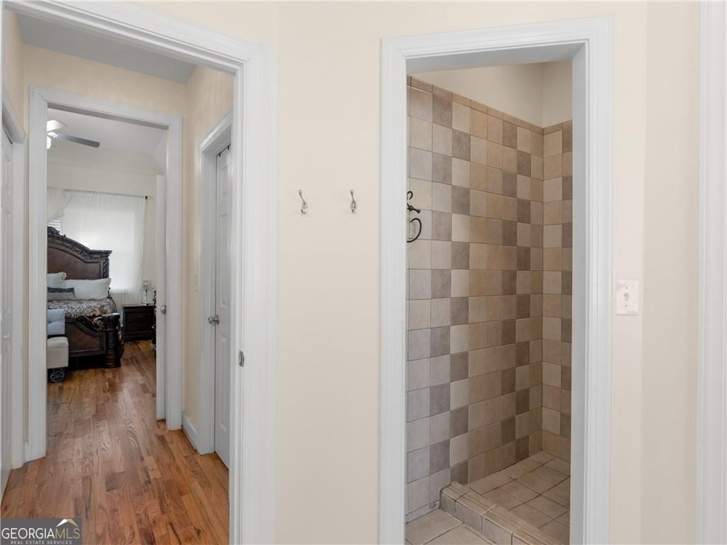 355 Parker Road Covington, GA 30014 - Photo 45 of 60 a view of a bathroom from a hallway
