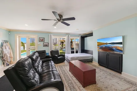 a living room with furniture and a window