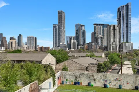a view of a city with tall buildings