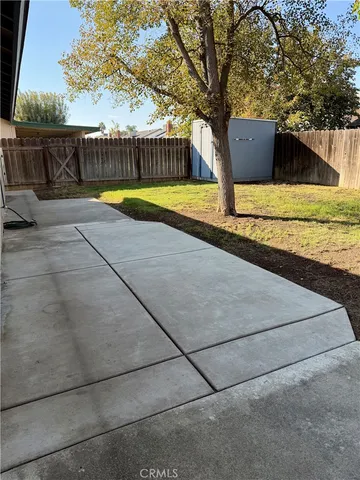 a view of swimming pool with a patio