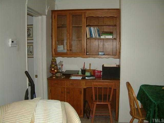 5780 Brogden Road Smithfield, NC 27577 - Photo 6 of 12 Love the built in secretary and bookshelves.