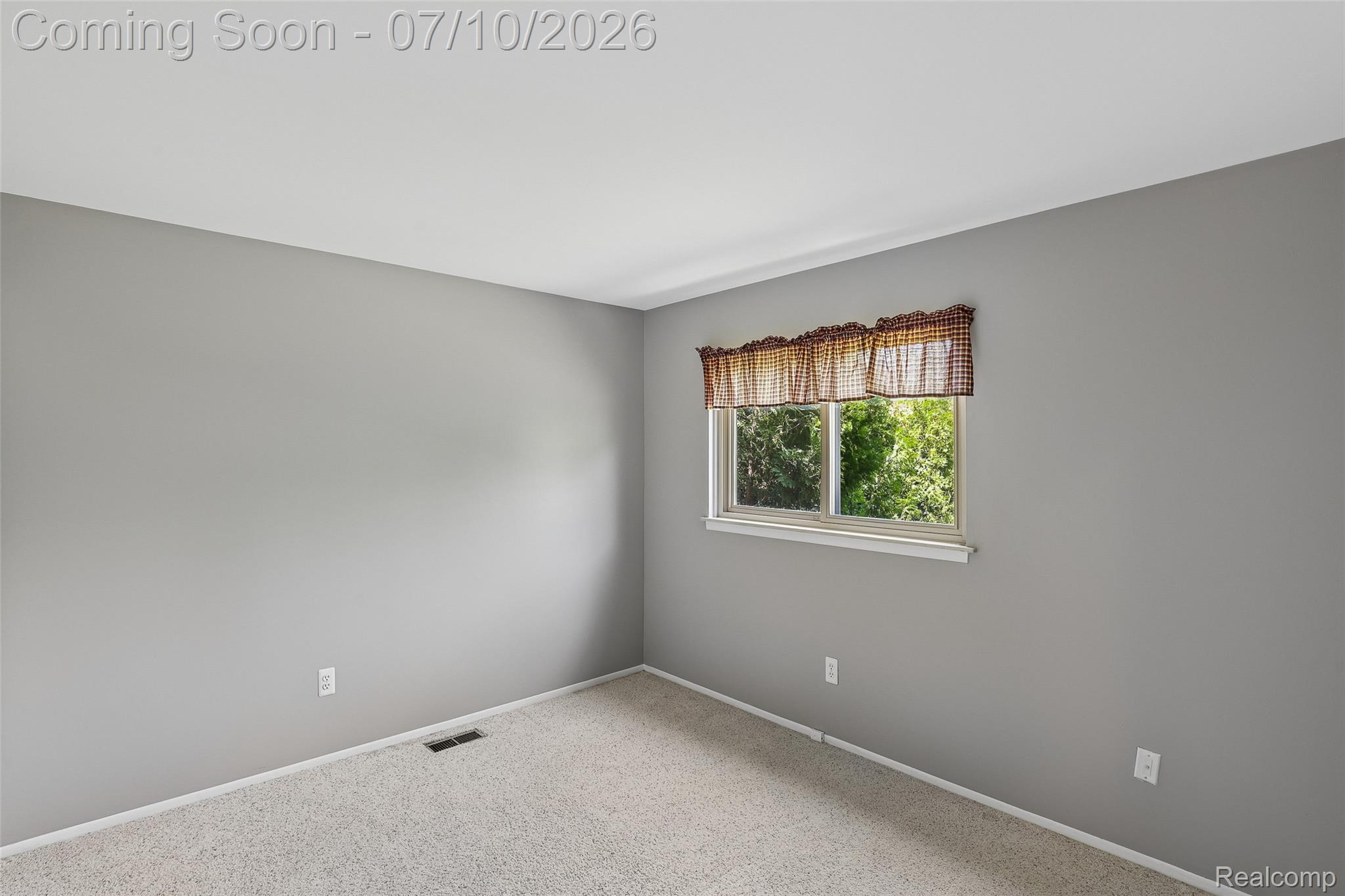 42698 Keystone Canton, MI 48187 - Photo 14 of 33 Neutral-toned wall paint with a single window featuring a light-filtering shade