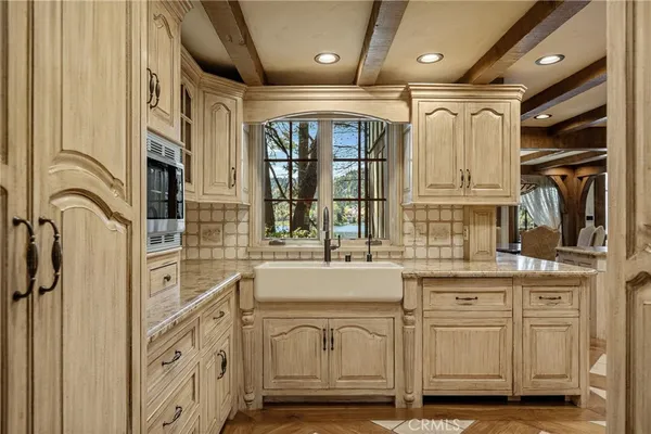 a large spacious bathroom with a large tub and shower