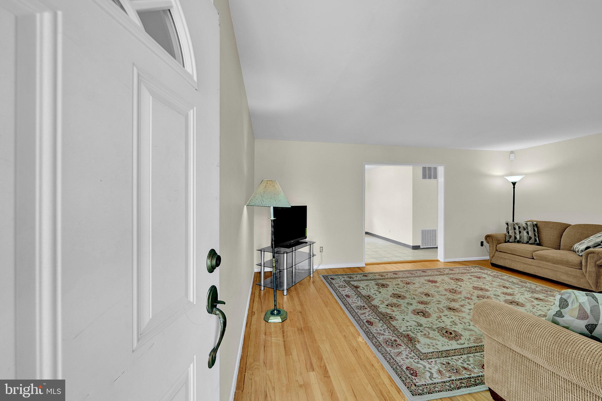 32 Sherbrooke Road Ewing, NJ 08638 - Photo 6 of 47 a bedroom with a bed and a flat screen tv