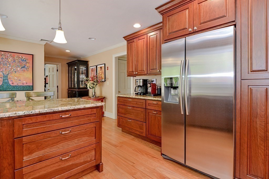 40 Southboro Road Upton, MA 01568 - Photo 11 of 42 a kitchen with stainless steel appliances granite countertop a refrigerator and a sink