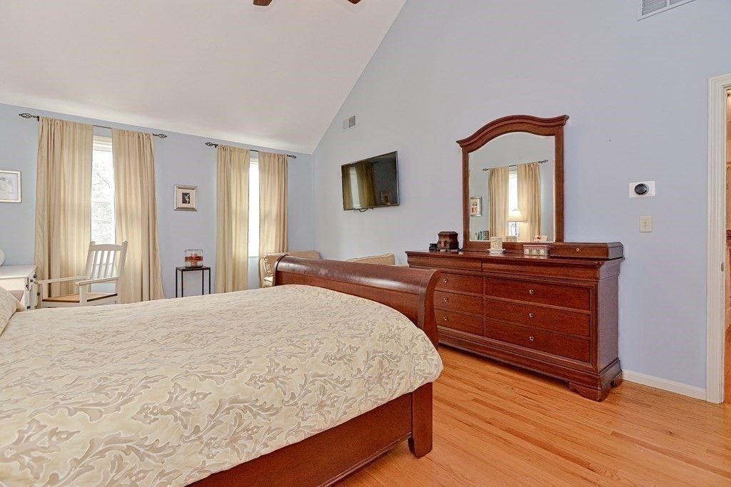 40 Southboro Road Upton, MA 01568 - Photo 24 of 42 a bedroom with a bed and a dresser