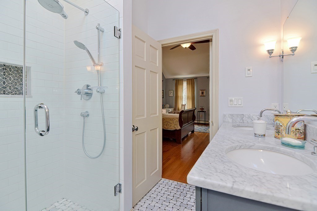 40 Southboro Road Upton, MA 01568 - Photo 28 of 42 a bathroom with a granite countertop sink and a mirror