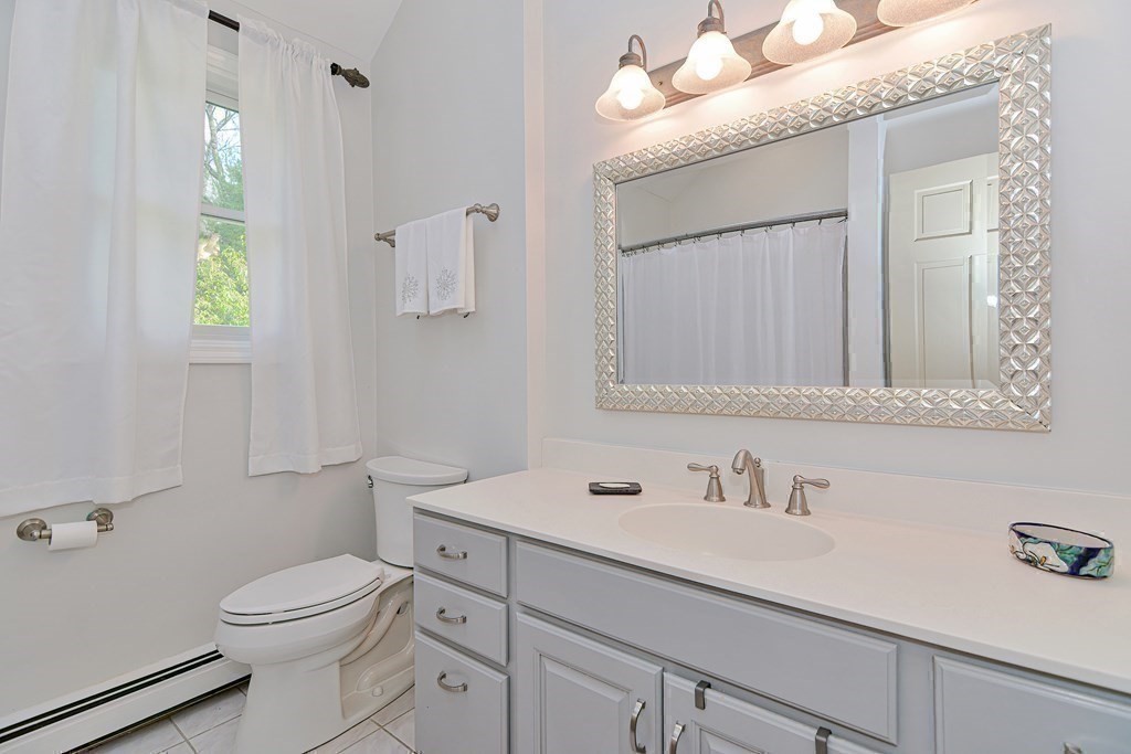 40 Southboro Road Upton, MA 01568 - Photo 33 of 42 a bathroom with a sink a toilet and shower