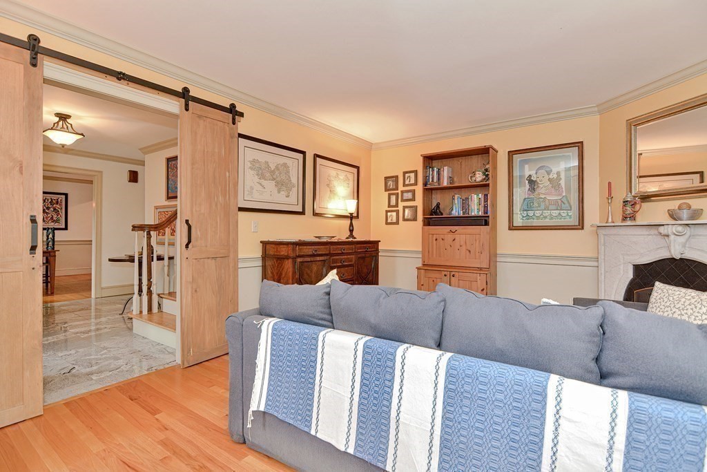 40 Southboro Road Upton, MA 01568 - Photo 8 of 42 a living room with furniture and a wooden floor