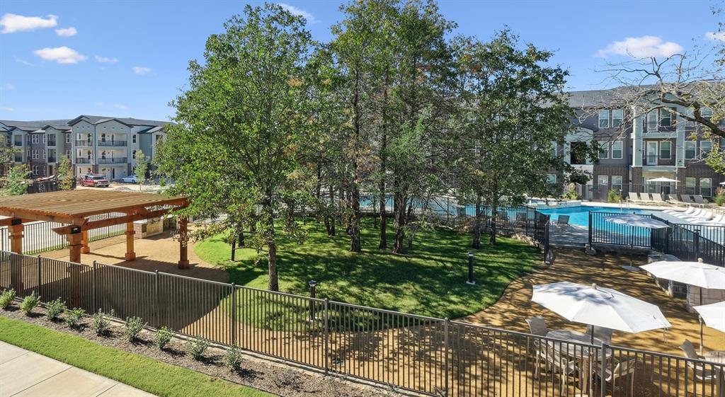 4600 East McKinney Street, Unit 5317 Denton, TX 76208 - Photo 12 of 40 a view of a backyard with sitting area