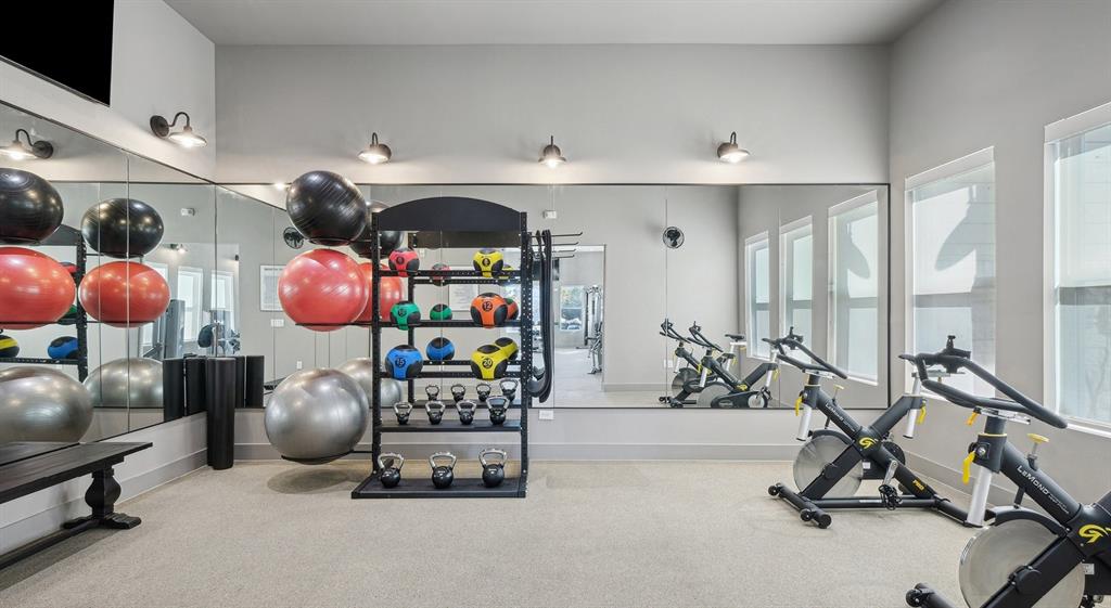 4600 East McKinney Street, Unit 5317 Denton, TX 76208 - Photo 20 of 40 a room with gym equipment