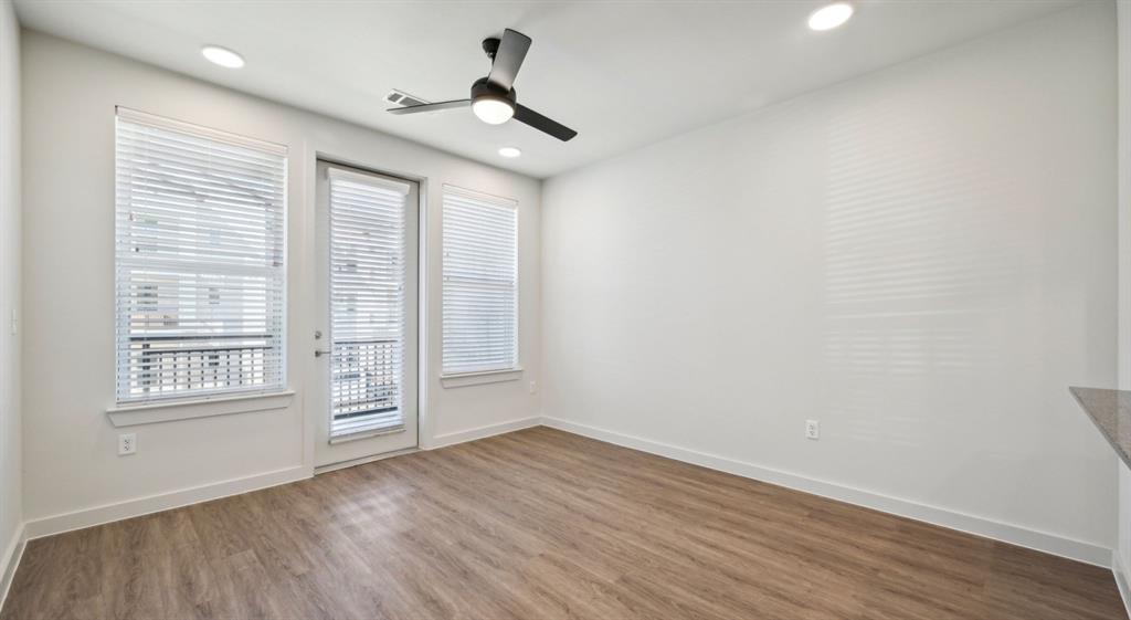 4600 East McKinney Street, Unit 5317 Denton, TX 76208 - Photo 21 of 40 wooden floor in an empty room with a window