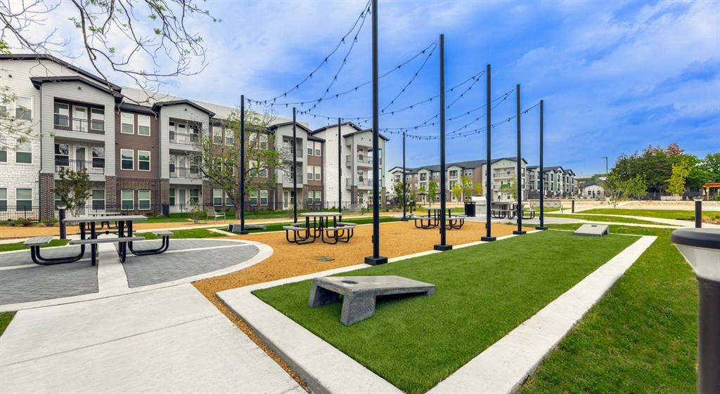 4600 East McKinney Street, Unit 5317 Denton, TX 76208 - Photo 7 of 40 a view of a swimming pool with a lounge chairs