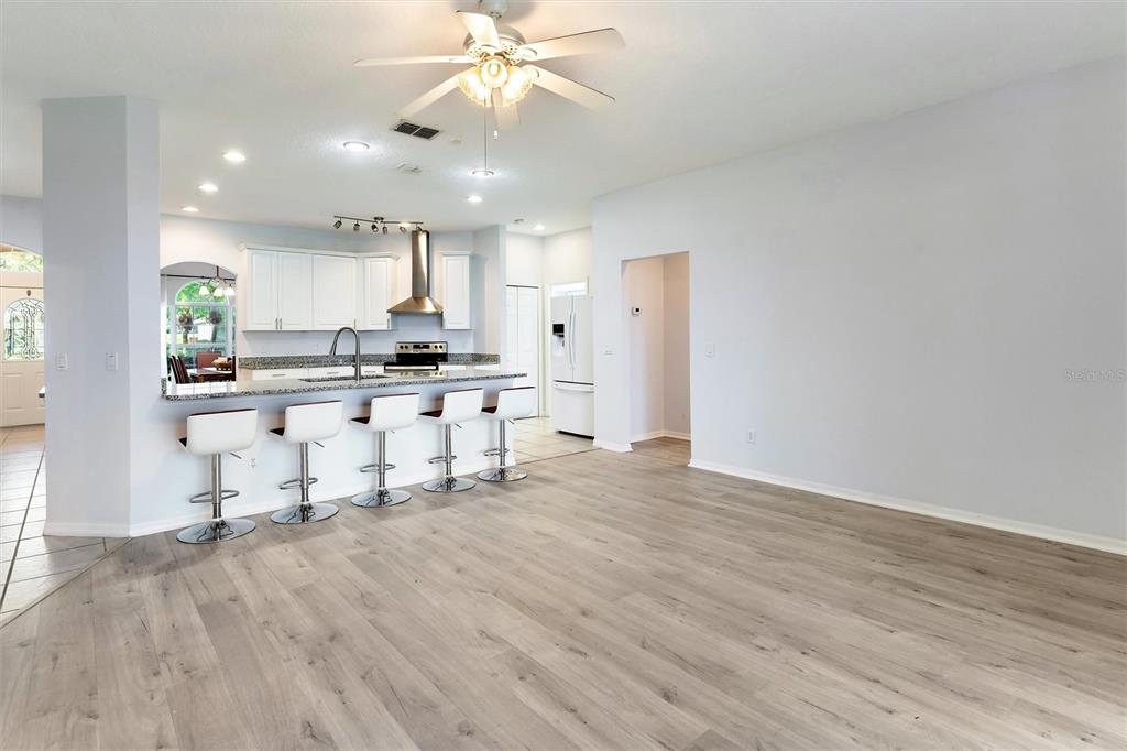 3984 Beacon Ridge Way Clermont, FL 34711 - Photo 20 of 59 Family Room/Kitchen