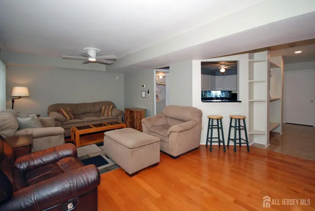 a living room with furniture and a table