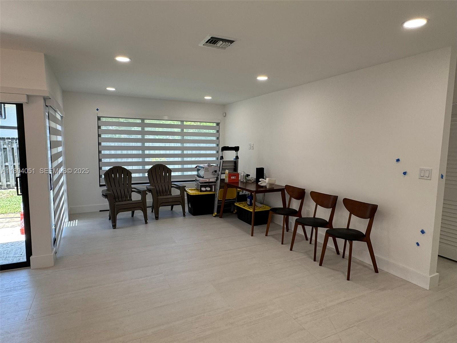 12721 Southwest 68th Terrace Miami, FL 33183 - Photo 12 of 31 a view of a livingroom with furniture and a window
