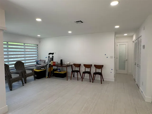 a view of a hallway with closet
