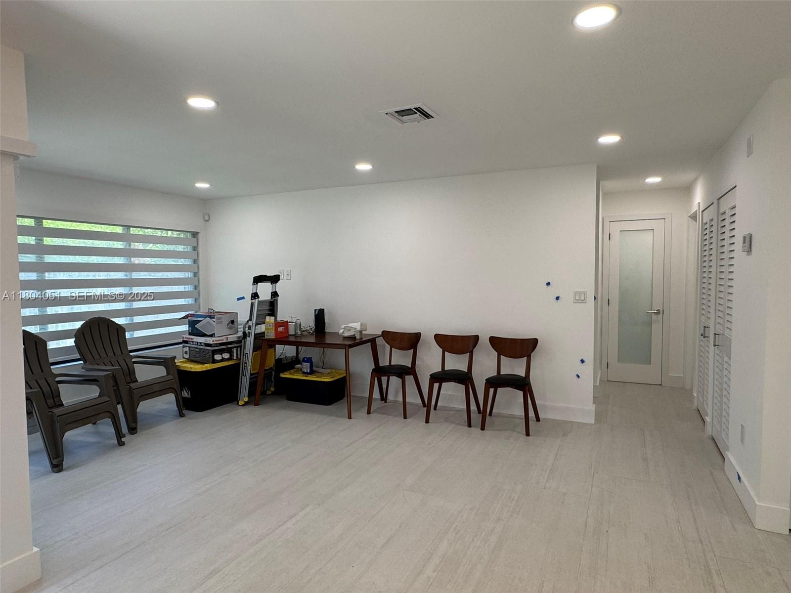 12721 Southwest 68th Terrace Miami, FL 33183 - Photo 13 of 31 a living room with furniture