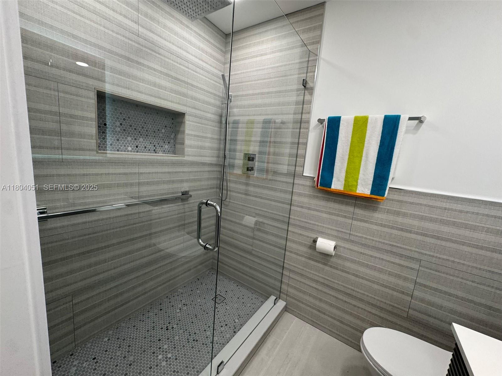 12721 Southwest 68th Terrace Miami, FL 33183 - Photo 21 of 31 a bathroom with a toilet and a shower