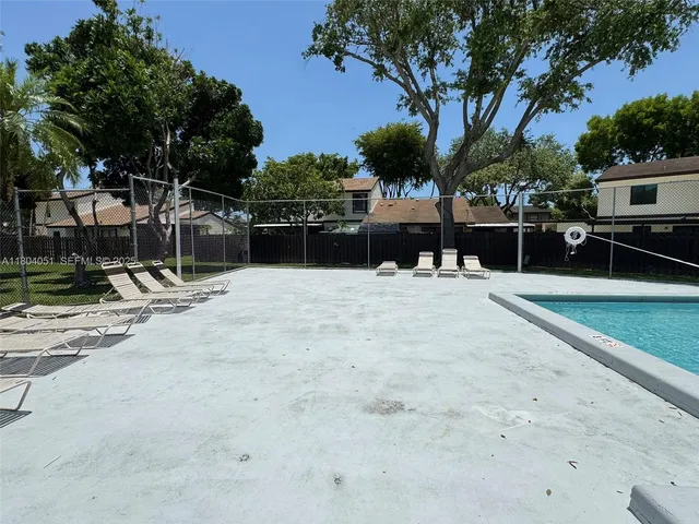 a view of a yard with entertaining space