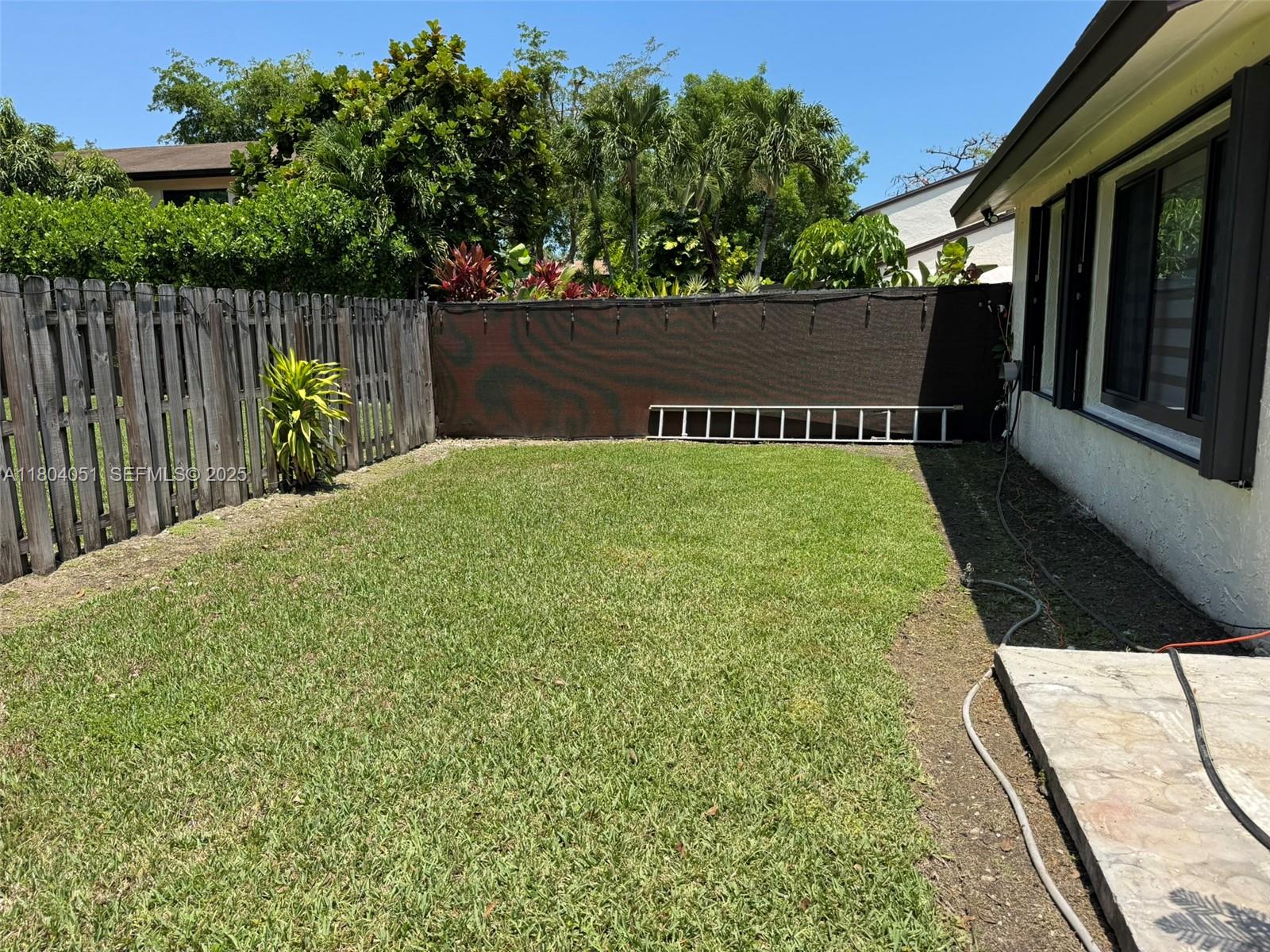 12721 Southwest 68th Terrace Miami, FL 33183 - Photo 9 of 31 a view of balcony with wooden floor and lake view