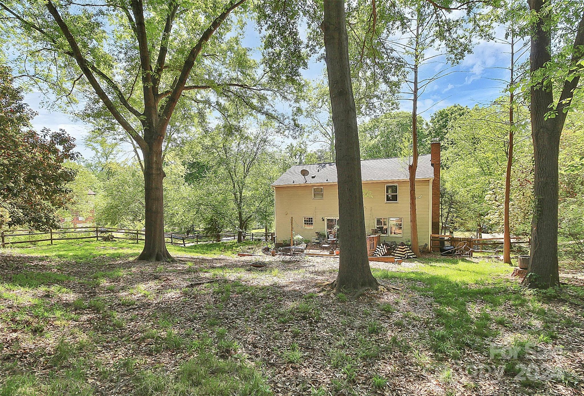 6225 Pella Road Charlotte, NC 28211 - Photo 7 of 7 a view of a yard with tree s