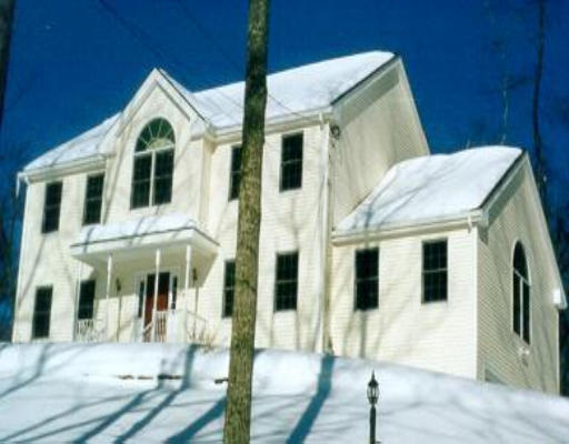 15 Morton Station Road Charlton, MA 01507 - Photo 1 of 1 a front view of a house with a yard