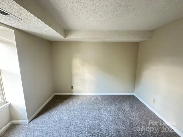 a bathroom with a sink toilet and mirror