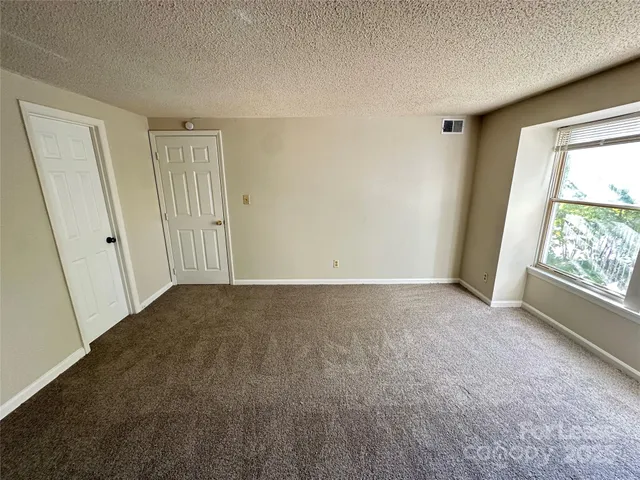 an empty room with an entryway