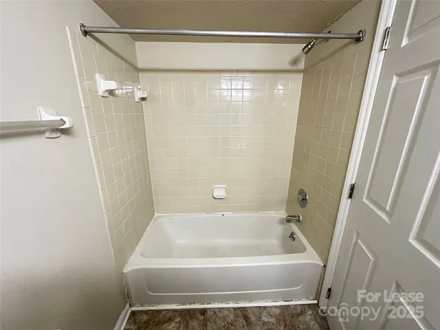 a view of balcony with furniture