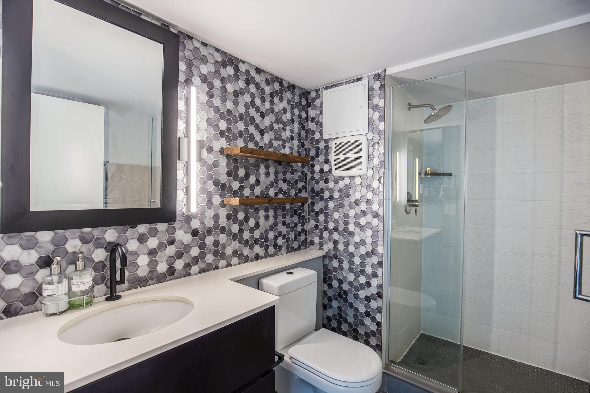 1401 R Street Northwest, Unit 303 Washington, DC 20009 - Photo 2 of 28 Fully renovated bathroom