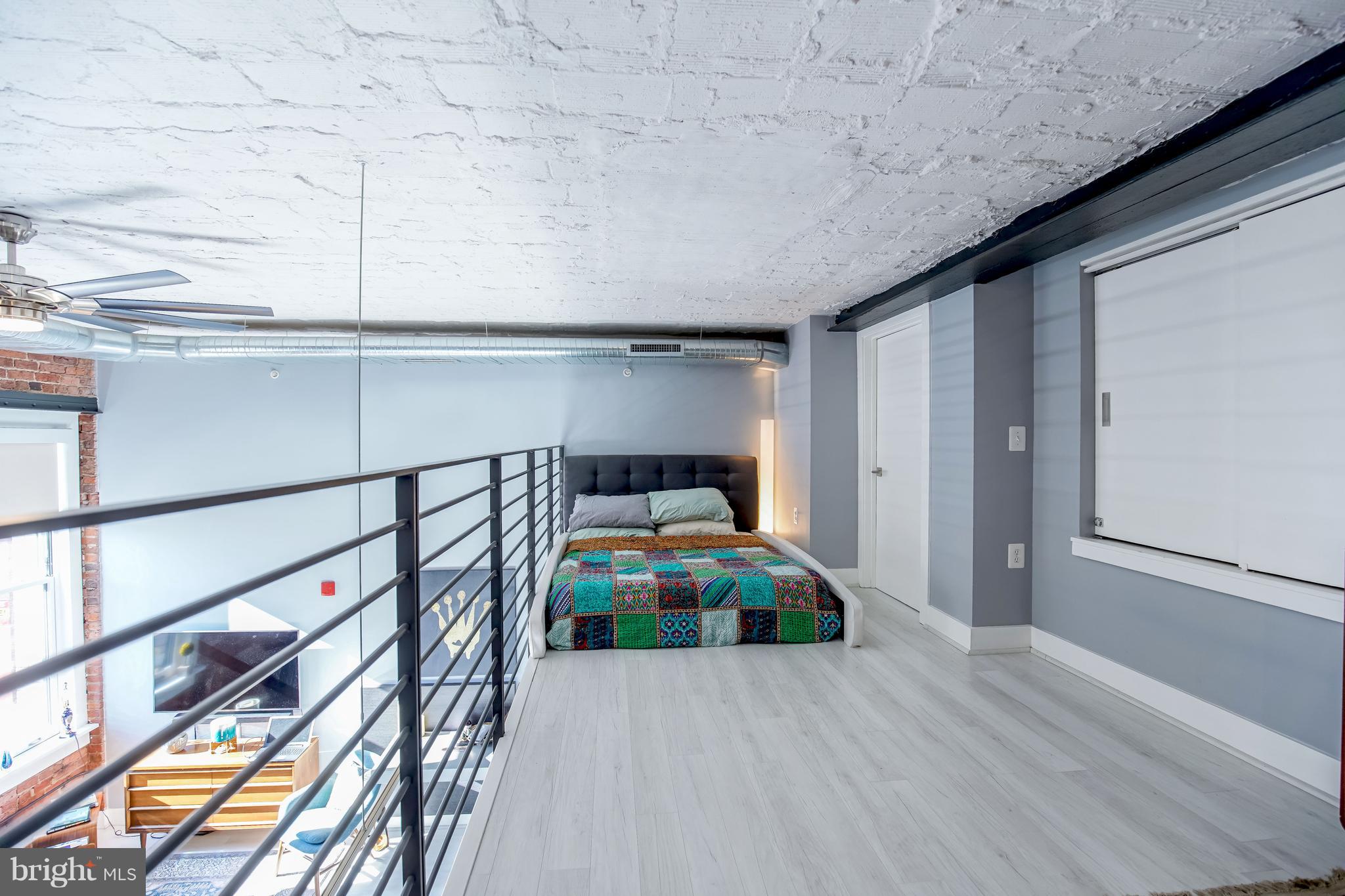 1401 R Street Northwest, Unit 303 Washington, DC 20009 - Photo 14 of 28 The Loft bedroom and walk in closet