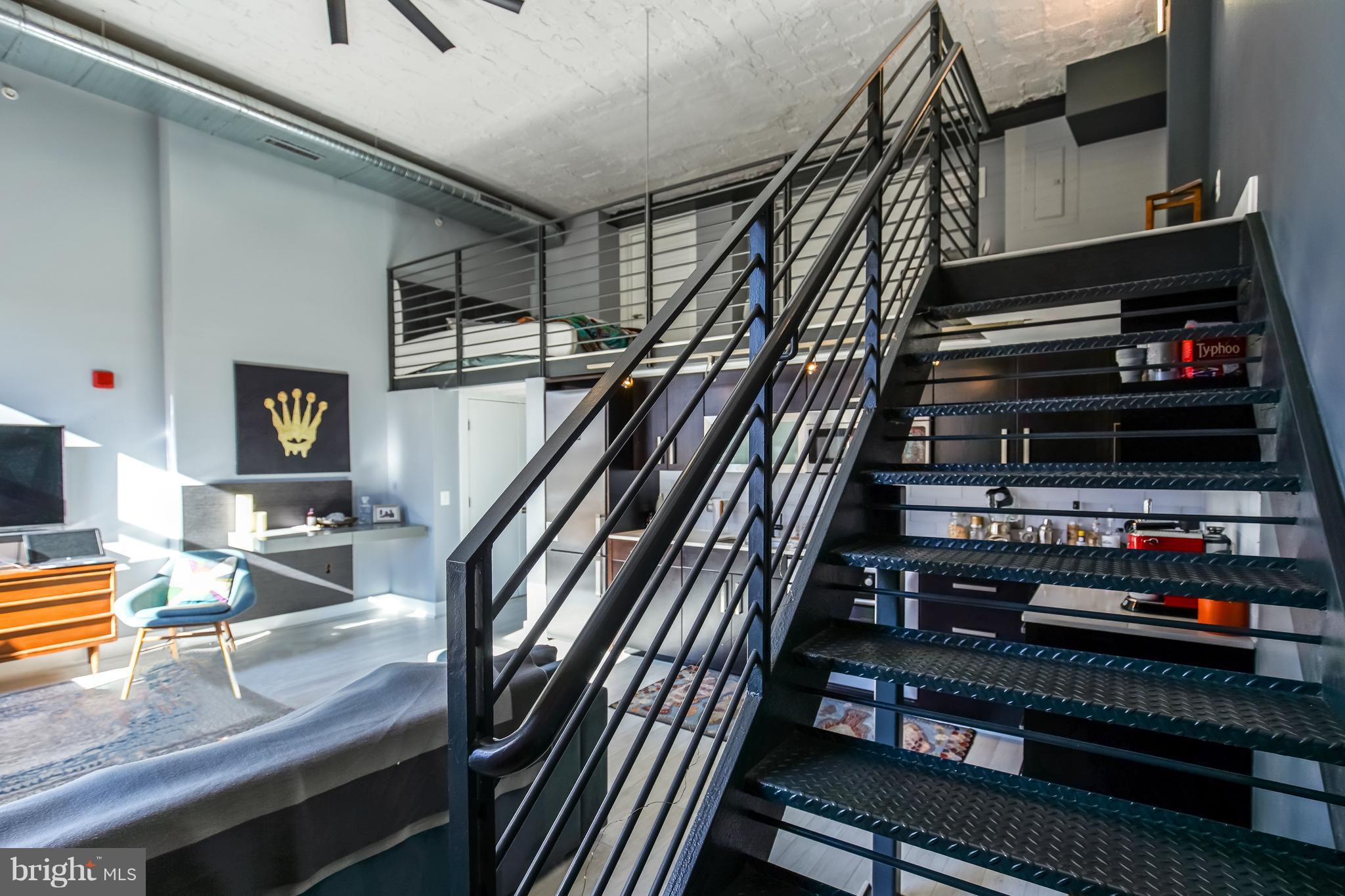 1401 R Street Northwest, Unit 303 Washington, DC 20009 - Photo 9 of 28 Stairway up the loft